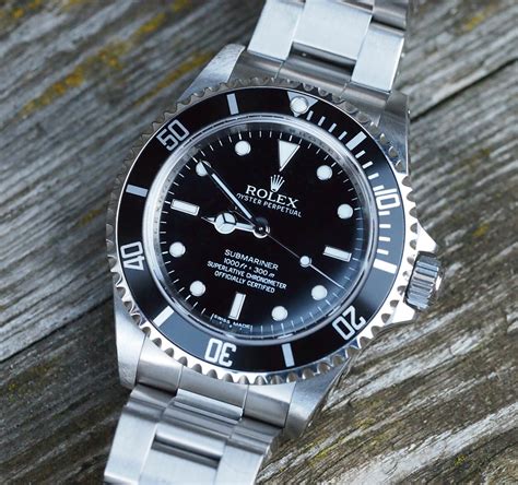 rolex submariner 14060m 4 line|preowned Rolex Submariner 14060m.